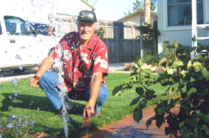 Irrigation contractor in Bowie fixes a pop up head